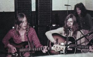 Mick “Woody” Woodmansey, back right, in the studio with Mick Ronson, left, and David Bowie
