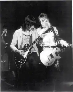 David Bowie and Jeff Beck performing at the Hammersmith Odeon farewell concert in 1973